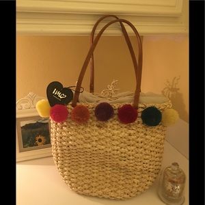 Women’s woven straw bag